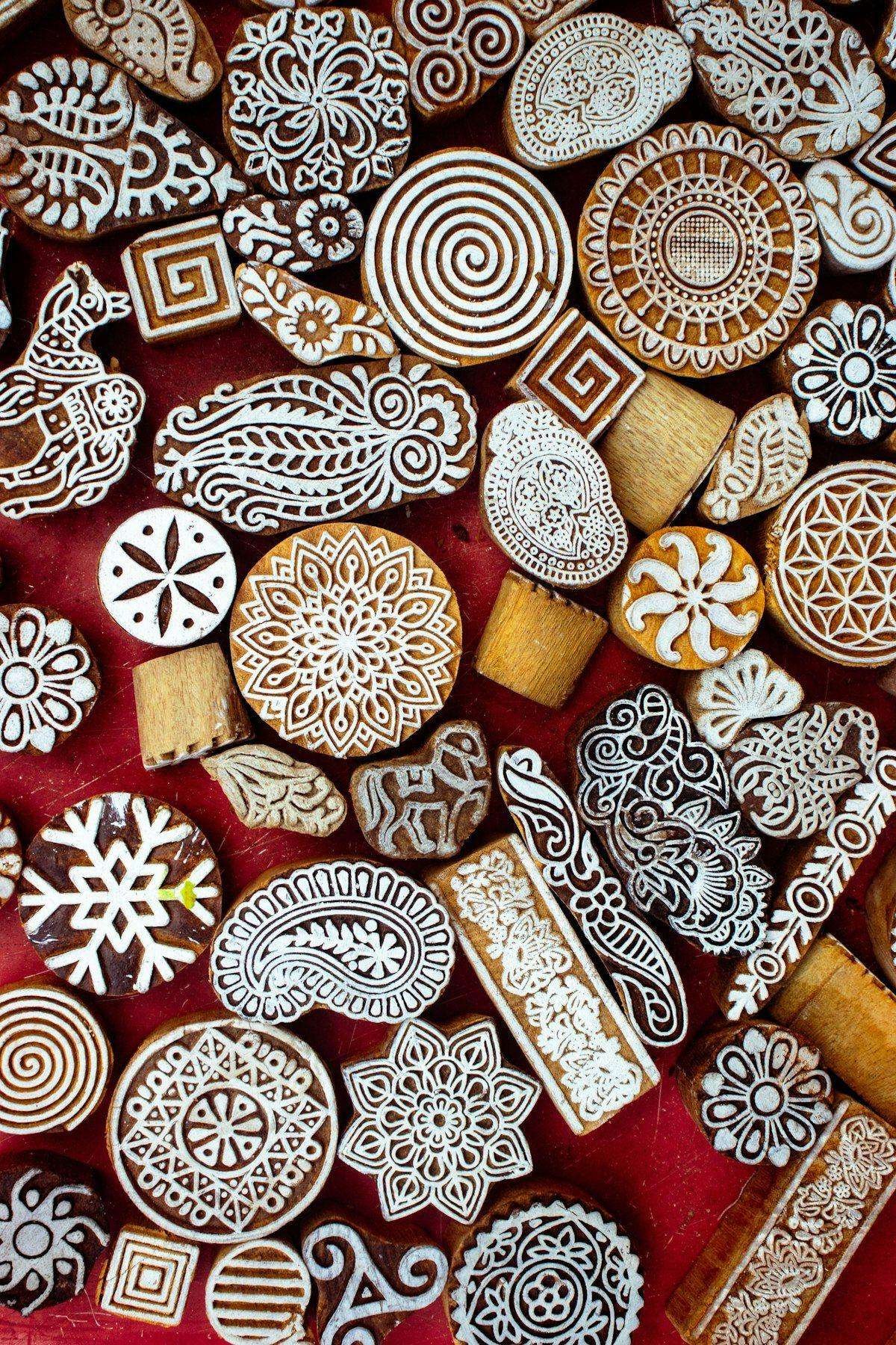 Illustrative image: colourful carved wooden printing blocks