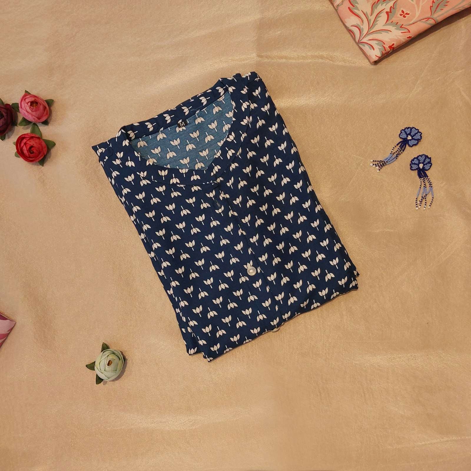Illustrative image: folded navy printed cotton kurti