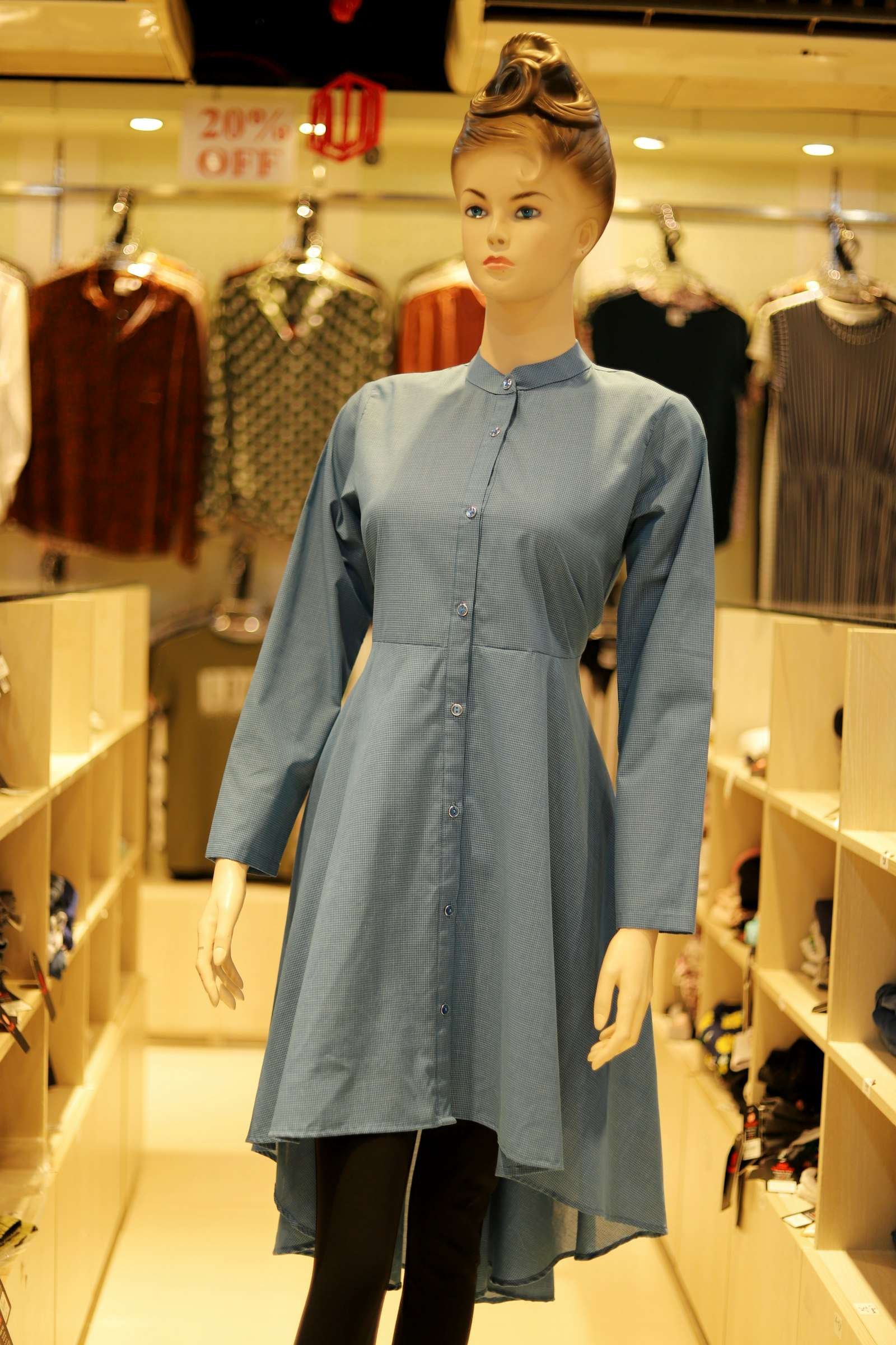 Illustrative image: plain blue-grey cotton kurti on a mannequin