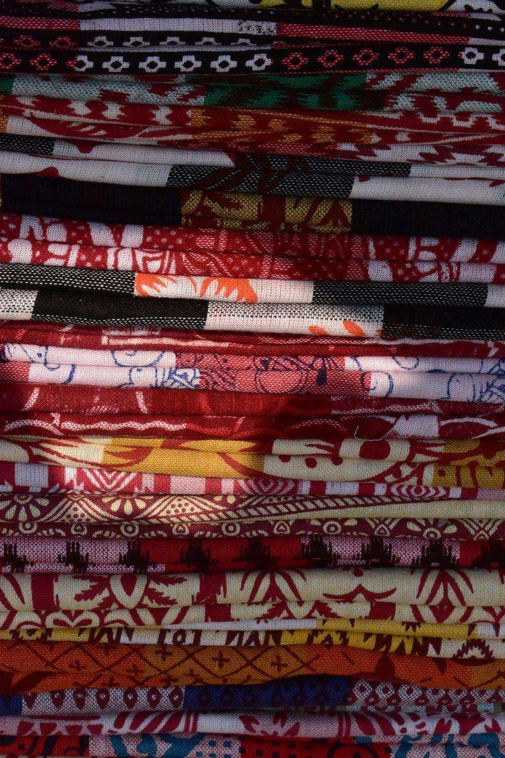 Illustrative image: stack of colourful patterned fabrics