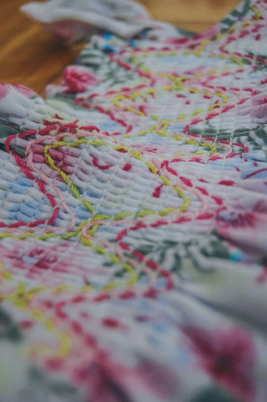 Illustrative image: close-up of hand running-stitch embroidery on fabric