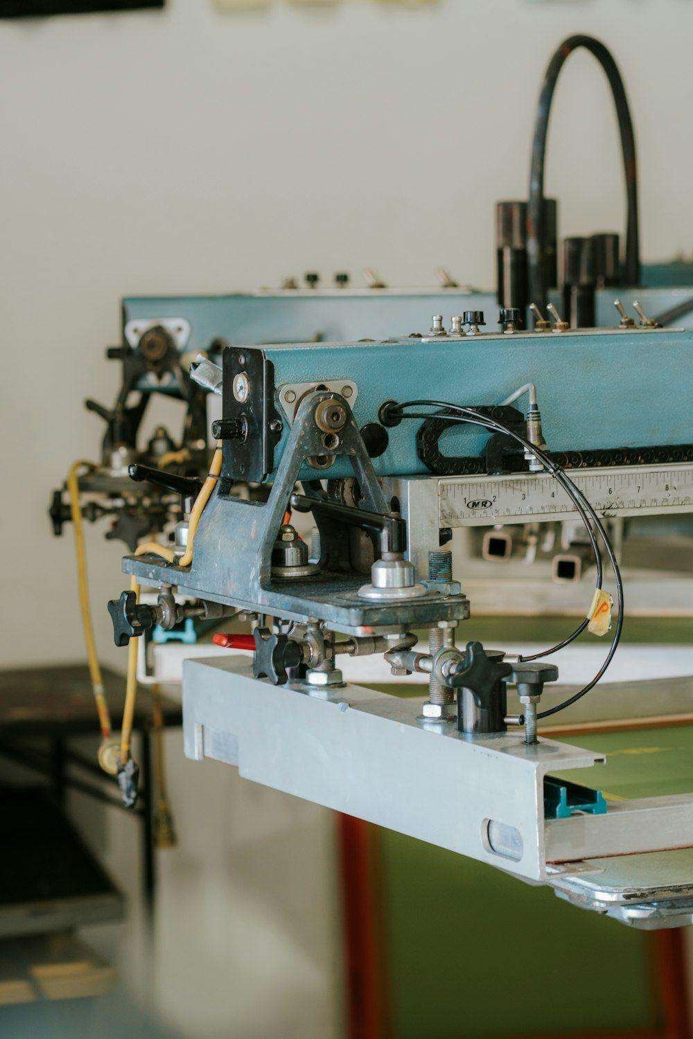 Illustrative image: screen printing machine in a workshop