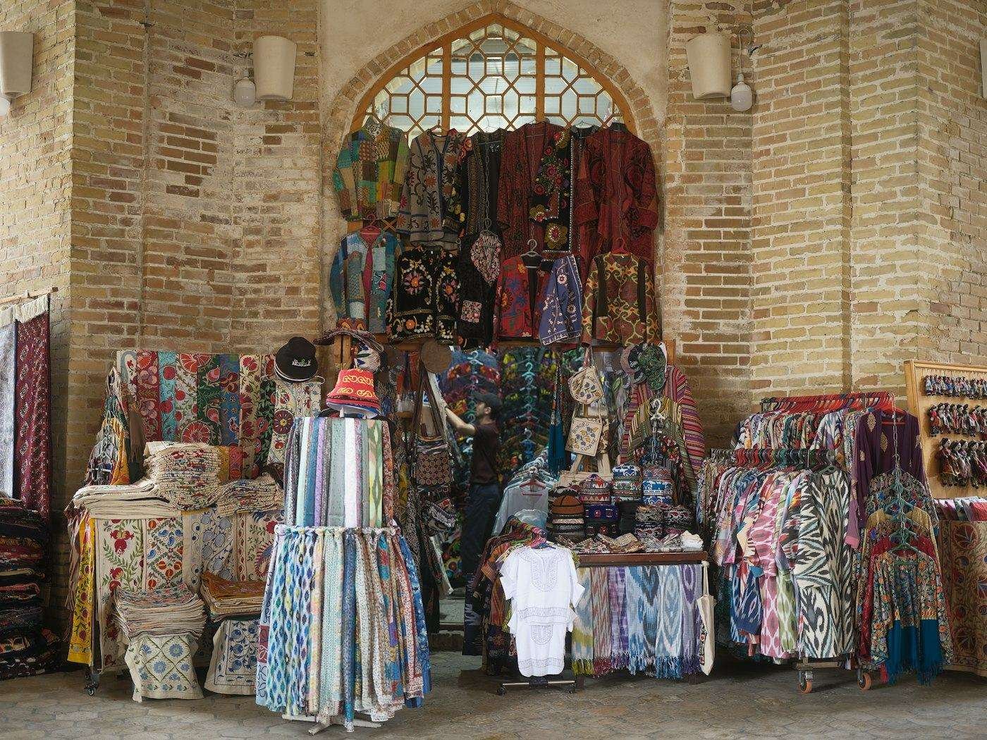 Illustrative image: market stall with printed textiles