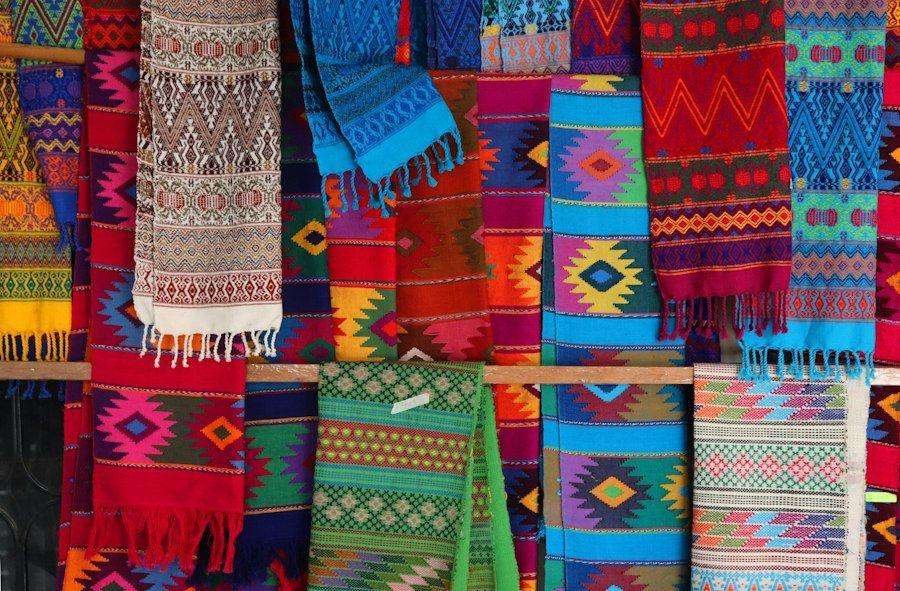 Illustrative image: assortment of colourful textiles